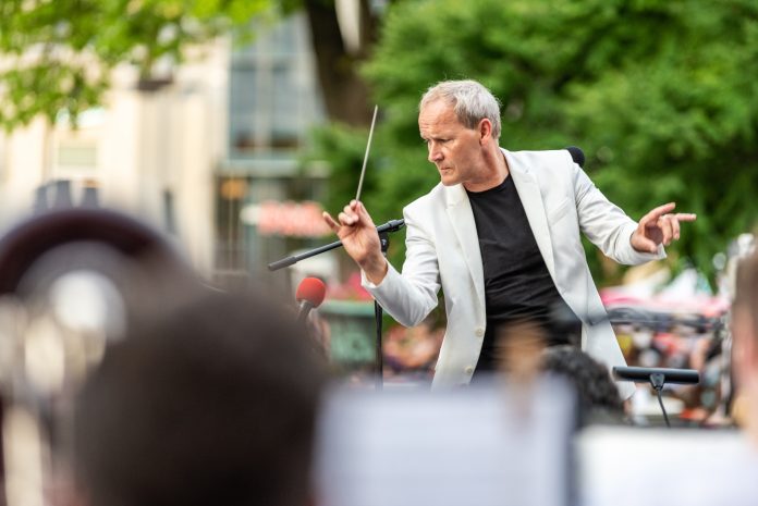A man conducting an orchestra