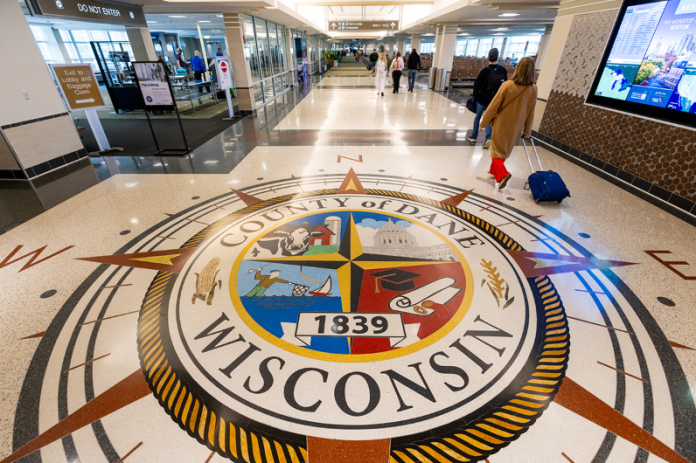Dane County seal on the MSN airport floor