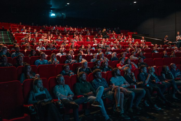 People sitting in a movie theater