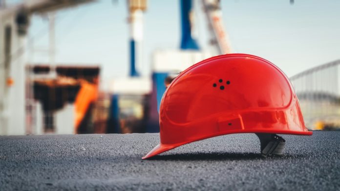 An orange construction hard hat